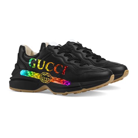 rhyton gucci print leather sneaker price|Gucci rhyton logo print.